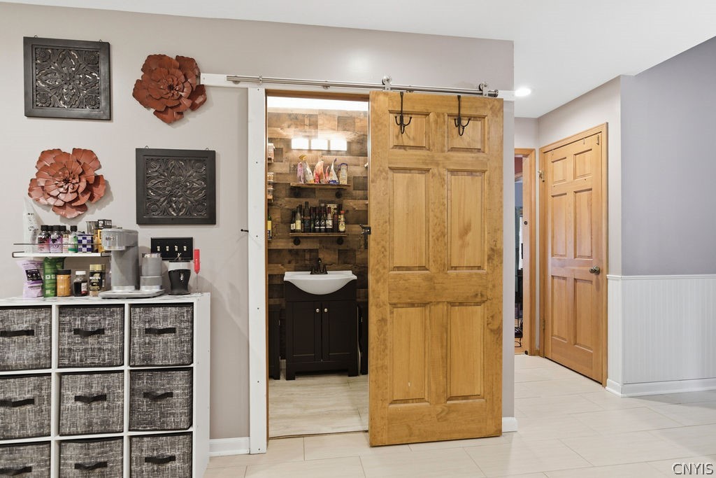 1000 Rail Fence Road Camillus, NY 13031 - Photo 6 of 37 The large walk-in pantry includes a prep sink, mak