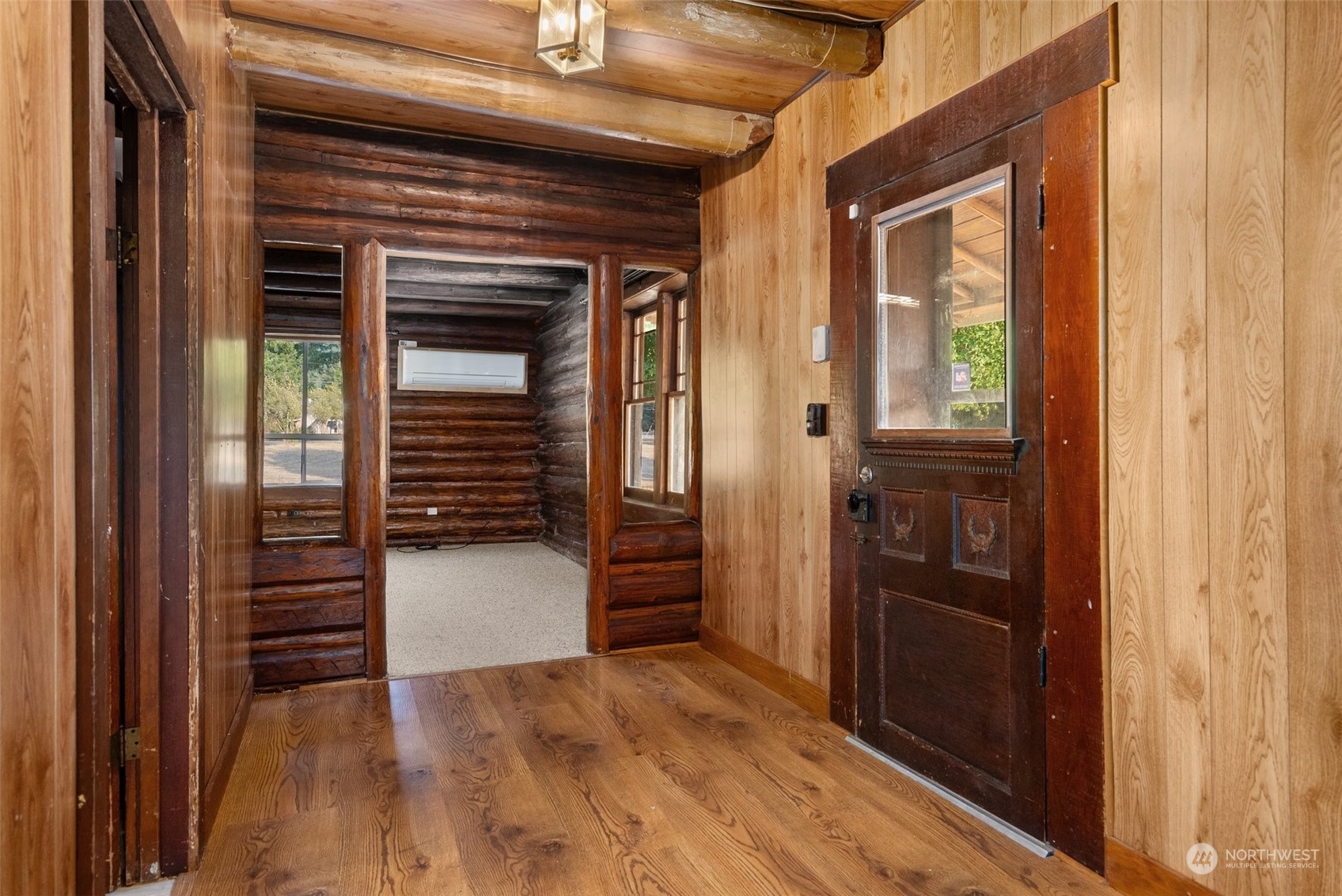 111 Huntington Road Packwood, WA 98361 - Photo 14 of 40 a view of walk in closet and wooden door