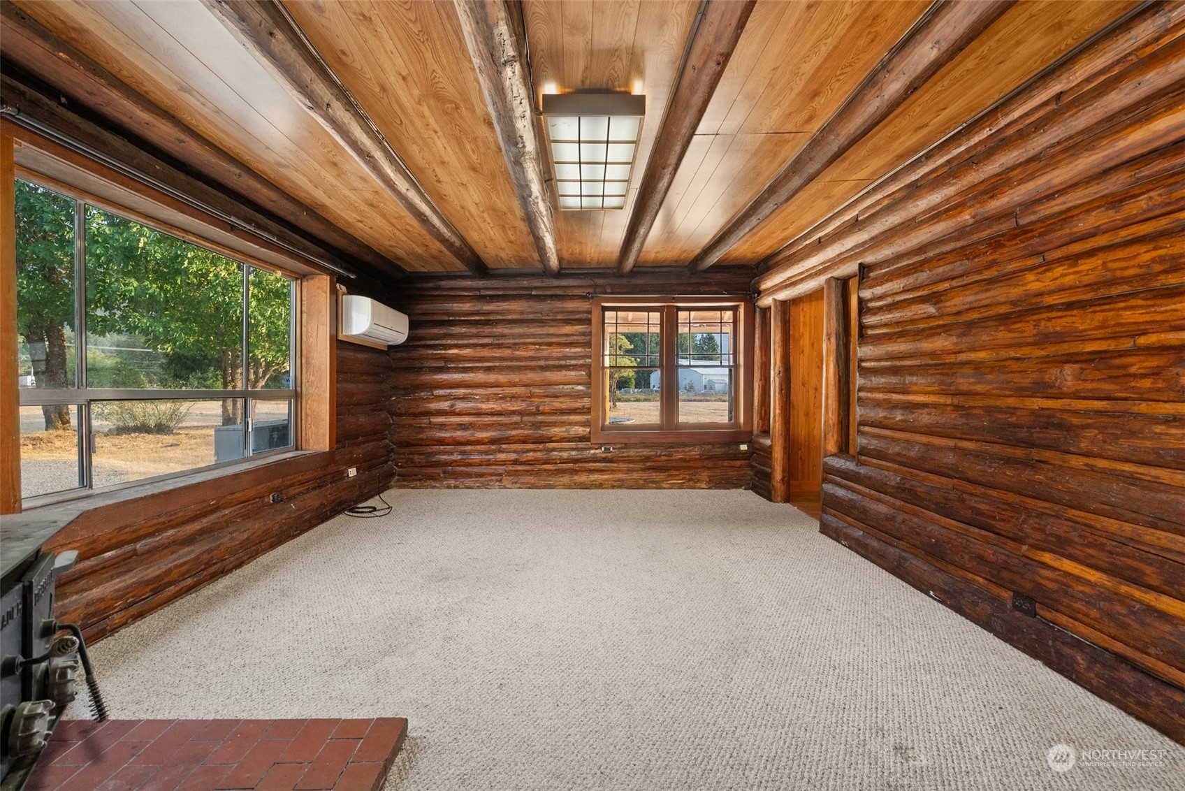 111 Huntington Road Packwood, WA 98361 - Photo 16 of 40 a view of an empty room with windows