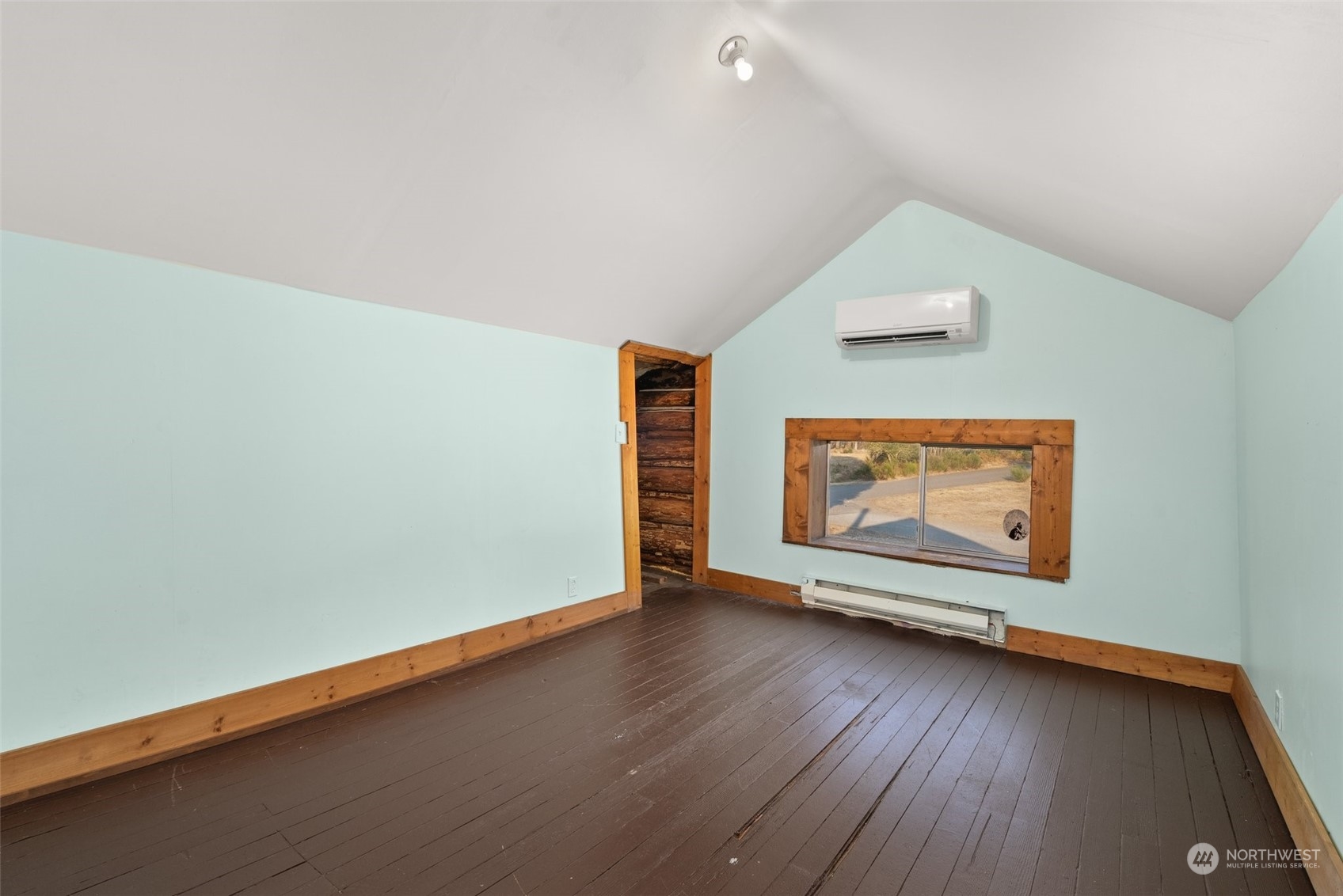 111 Huntington Road Packwood, WA 98361 - Photo 22 of 40 wooden floor in an empty room with a window