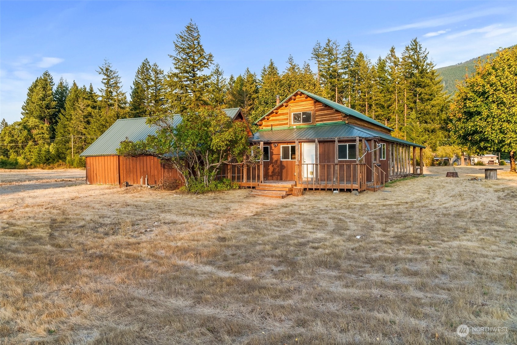 111 Huntington Road Packwood, WA 98361 - Photo 27 of 40 a front view of a house with a yard