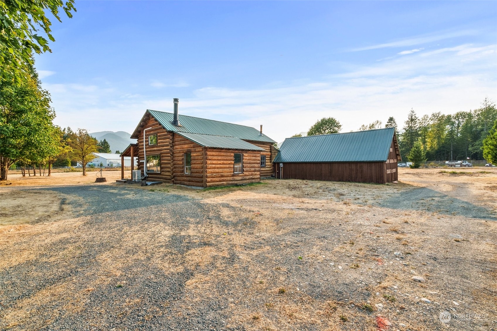 111 Huntington Road Packwood, WA 98361 - Photo 39 of 40 a front view of a house with a yard