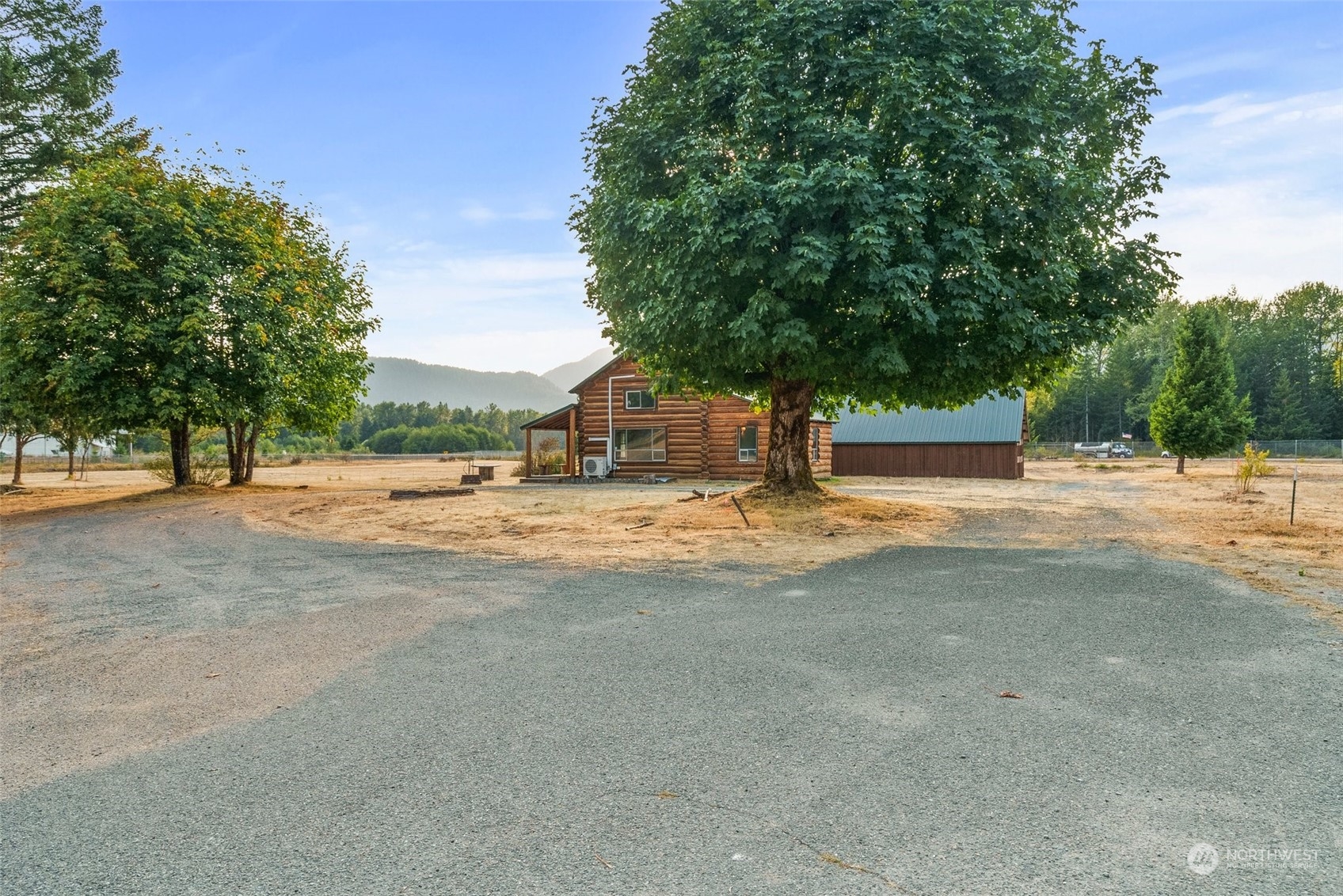 111 Huntington Road Packwood, WA 98361 - Photo 10 of 40 a view of road with large trees