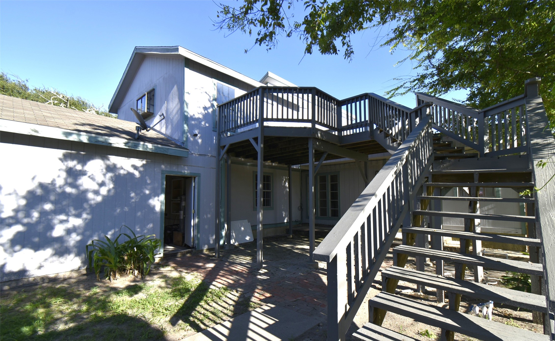 5405 Avenue R Galveston, TX 77551 - Photo 18 of 30 a view of a house with a tree front of house