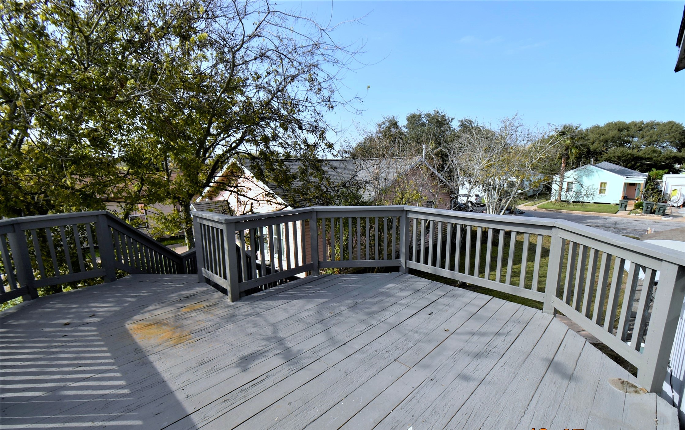 5405 Avenue R Galveston, TX 77551 - Photo 20 of 30 a view of a wooden deck