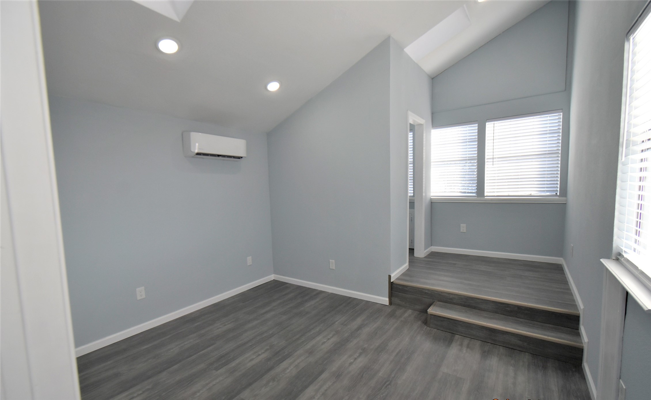 5405 Avenue R Galveston, TX 77551 - Photo 28 of 30 an empty room with wooden floor and windows
