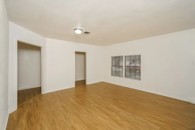 a bathroom with a shower and a toilet
