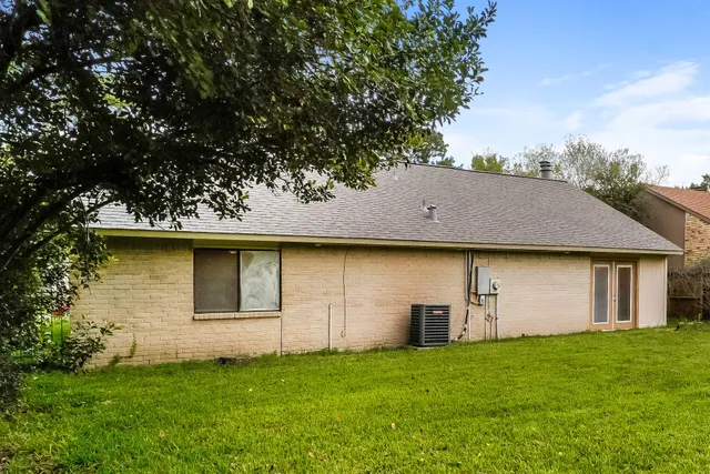 a picture of a book and a white bed