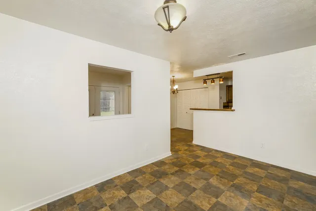 an empty room with a bathroom