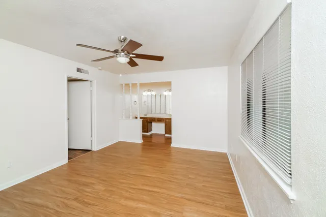 a bathroom with a sink a mirror and a bathtub