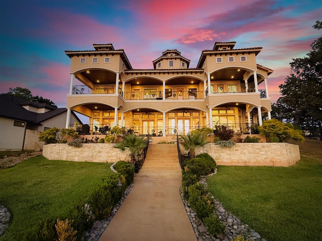 204 Pinnacle Club Place Mabank, TX 75156 - Photo 2 of 40 Italian villa–inspired architecture with 94 ft. of open waterfront