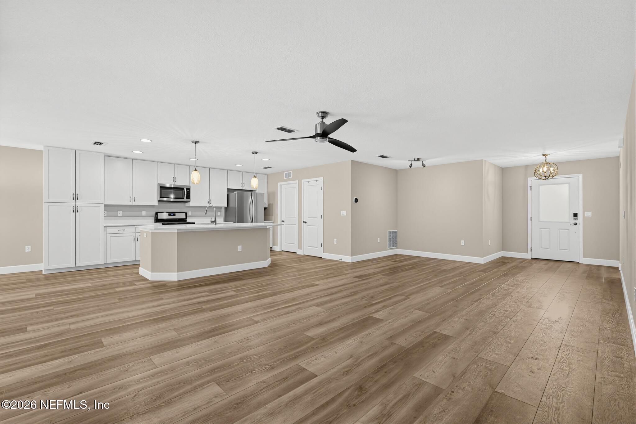 331 Meadow Ridge Drive St. Augustine, FL 32092 - Photo 5 of 36 12_331_Meadow_Ridge_Dr-Living_room-7786