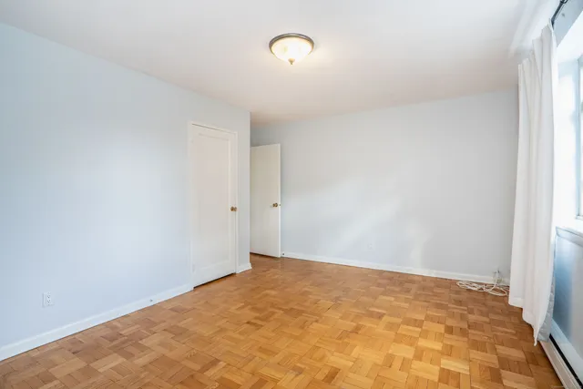 a view of a room with an empty space