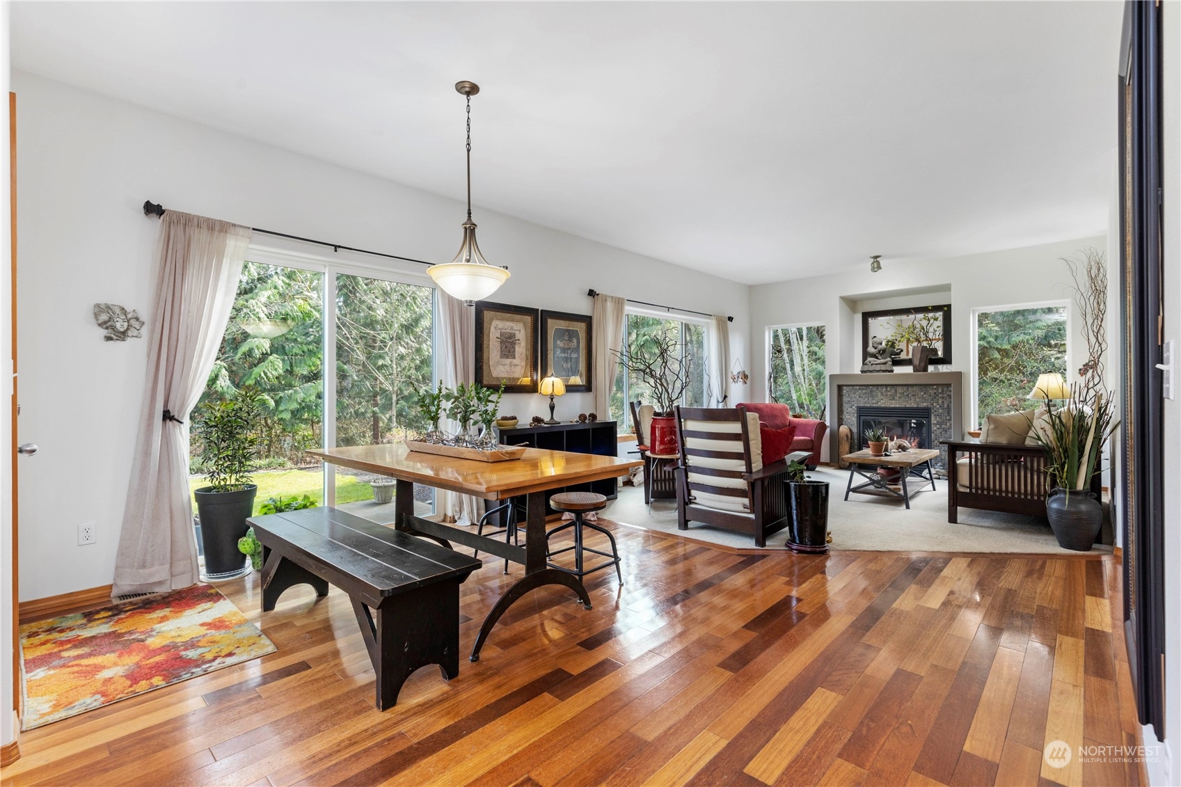4712 152nd Place Southeast Bothell, WA 98012 - Photo 11 of 31 a living room with furniture a window and a table