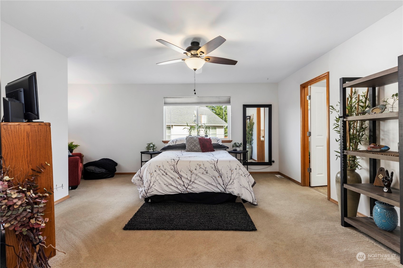 4712 152nd Place Southeast Bothell, WA 98012 - Photo 20 of 31 a bedroom with a bed furniture and a window