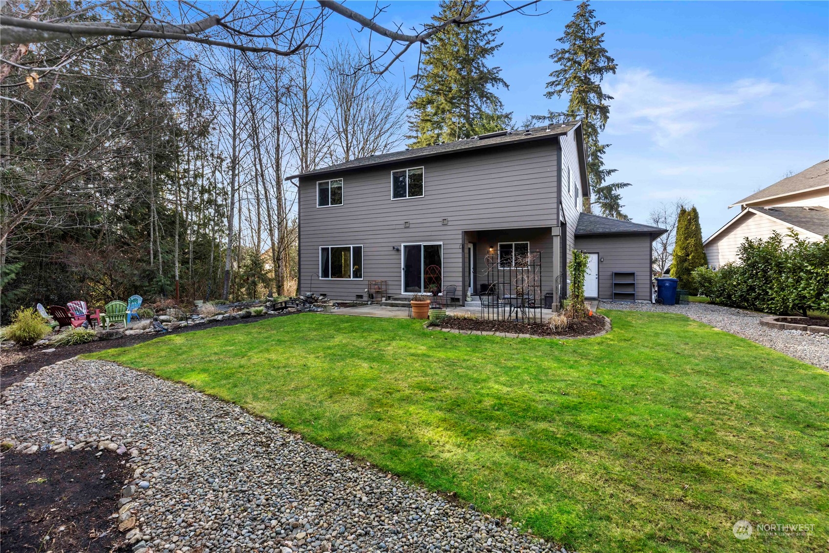 4712 152nd Place Southeast Bothell, WA 98012 - Photo 30 of 31 a house view with swimming pool and garden space