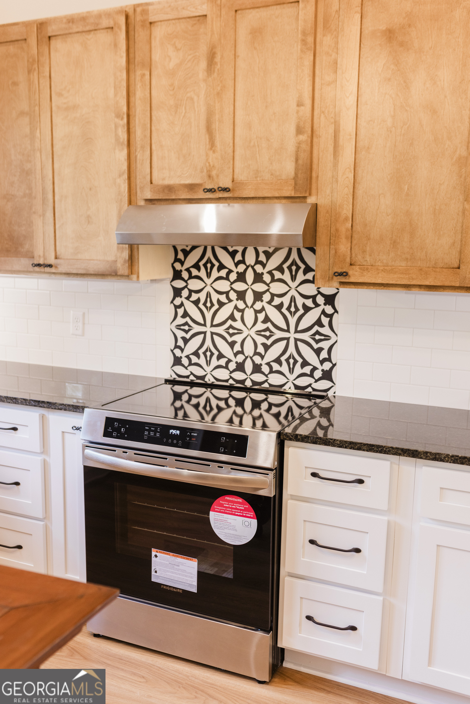 610 North Ridge Avenue Tifton, GA 31794 - Photo 23 of 32 a stove top oven sitting inside of a kitchen