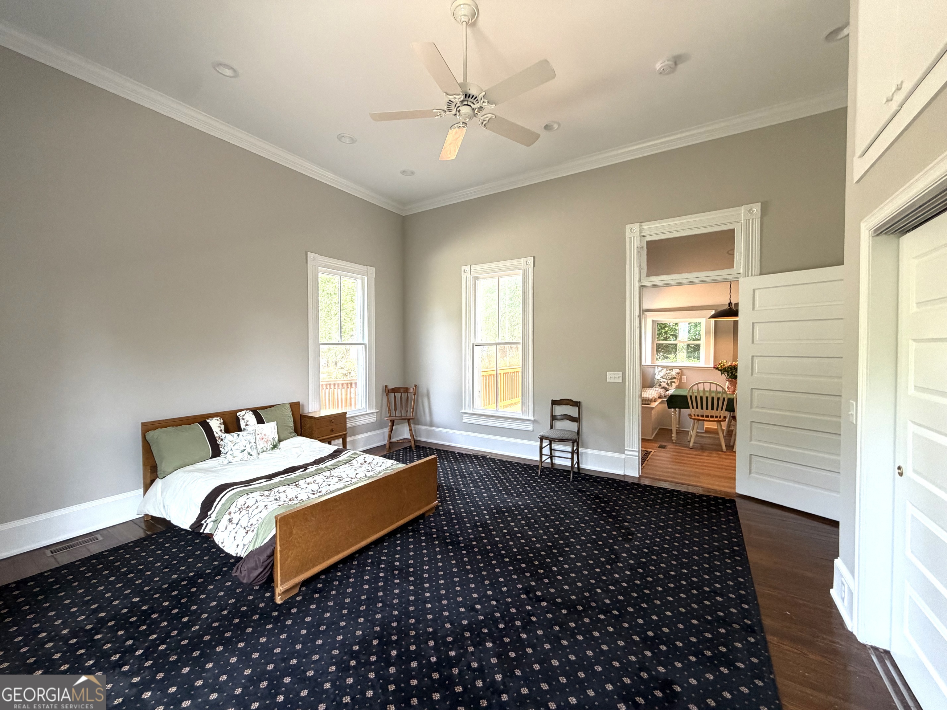 610 North Ridge Avenue Tifton, GA 31794 - Photo 25 of 32 a bedroom with a bed dresser and a window