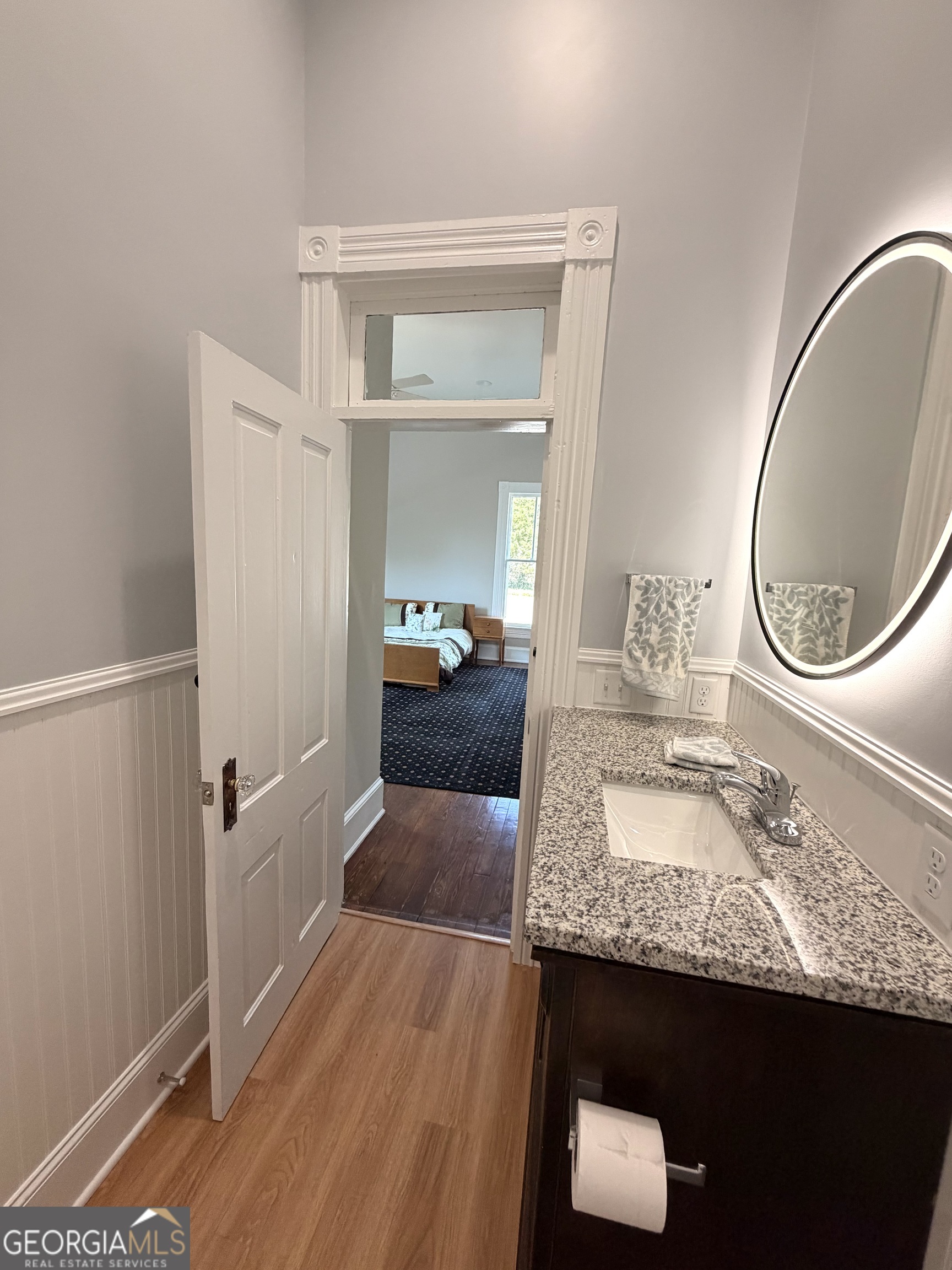 610 North Ridge Avenue Tifton, GA 31794 - Photo 28 of 32 a living room with granite countertop furniture and a mirror
