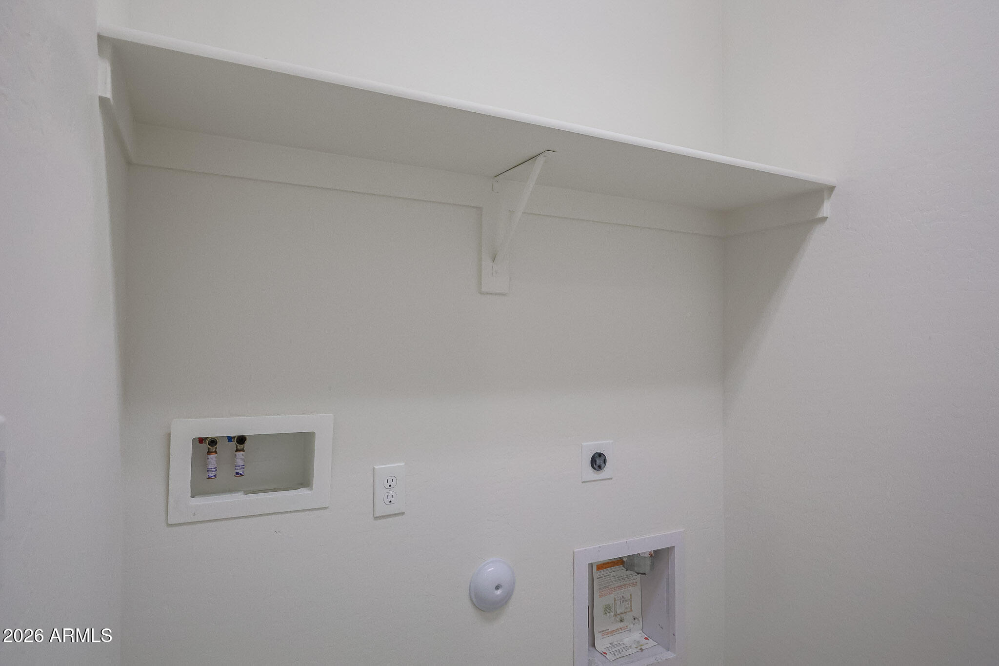 17592 West Hadley Street Goodyear, AZ 85338 - Photo 17 of 20 a view of a hallway
