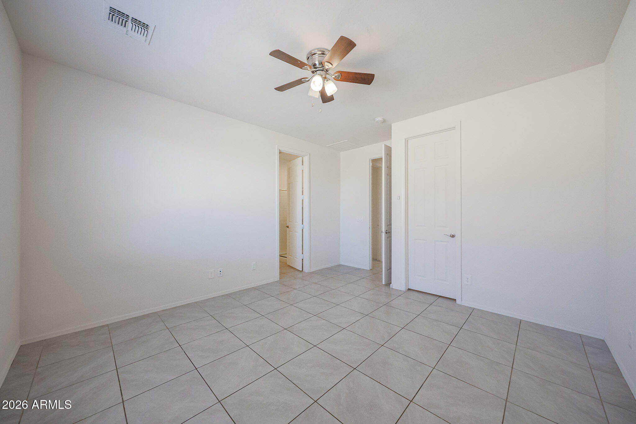 17592 West Hadley Street Goodyear, AZ 85338 - Photo 8 of 20 a view of an empty room