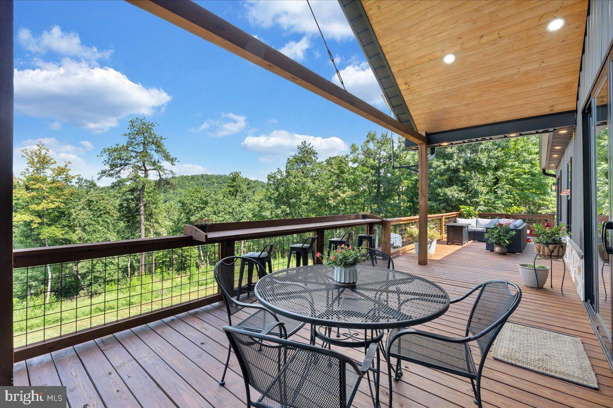 415 Grahams Farm Road Stuart, VA 24171 - Photo 78 of 121 Serene deck with lush green views.