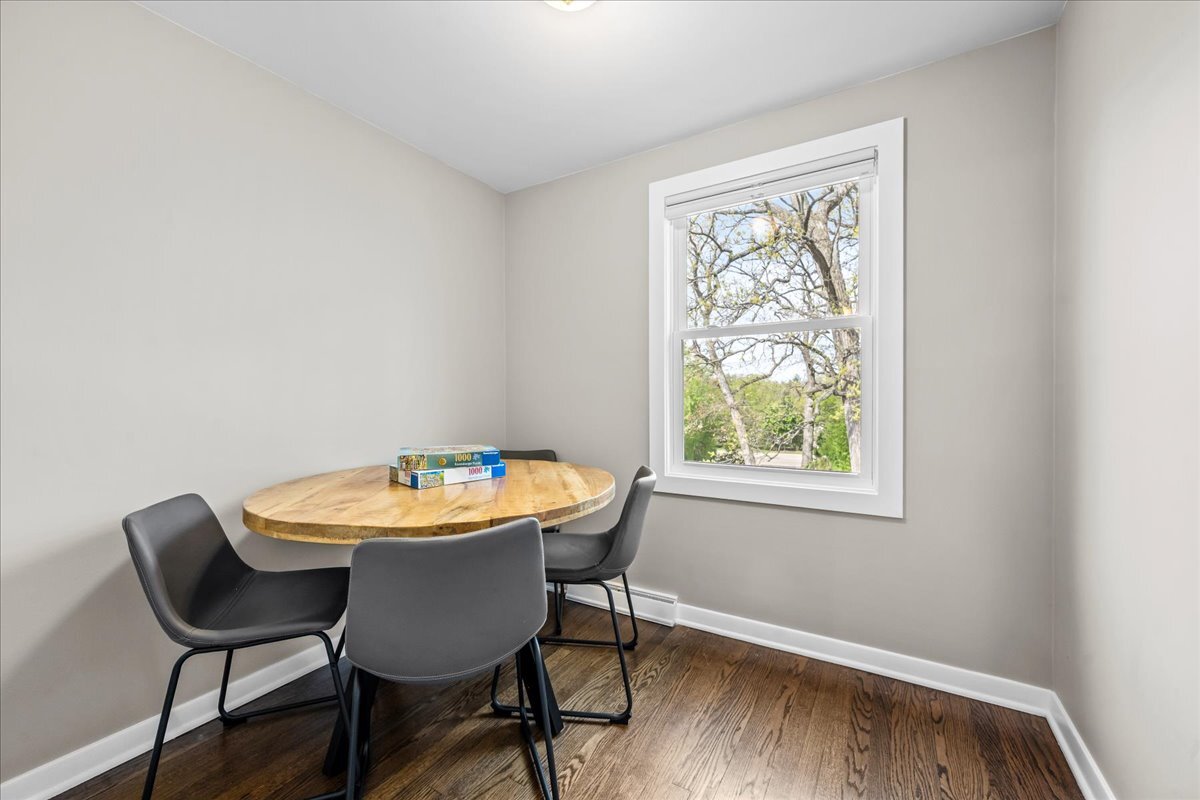 1541 Wilmot Road Deerfield, IL 60015 - Photo 17 of 25 a view of a workspace with furniture and a window