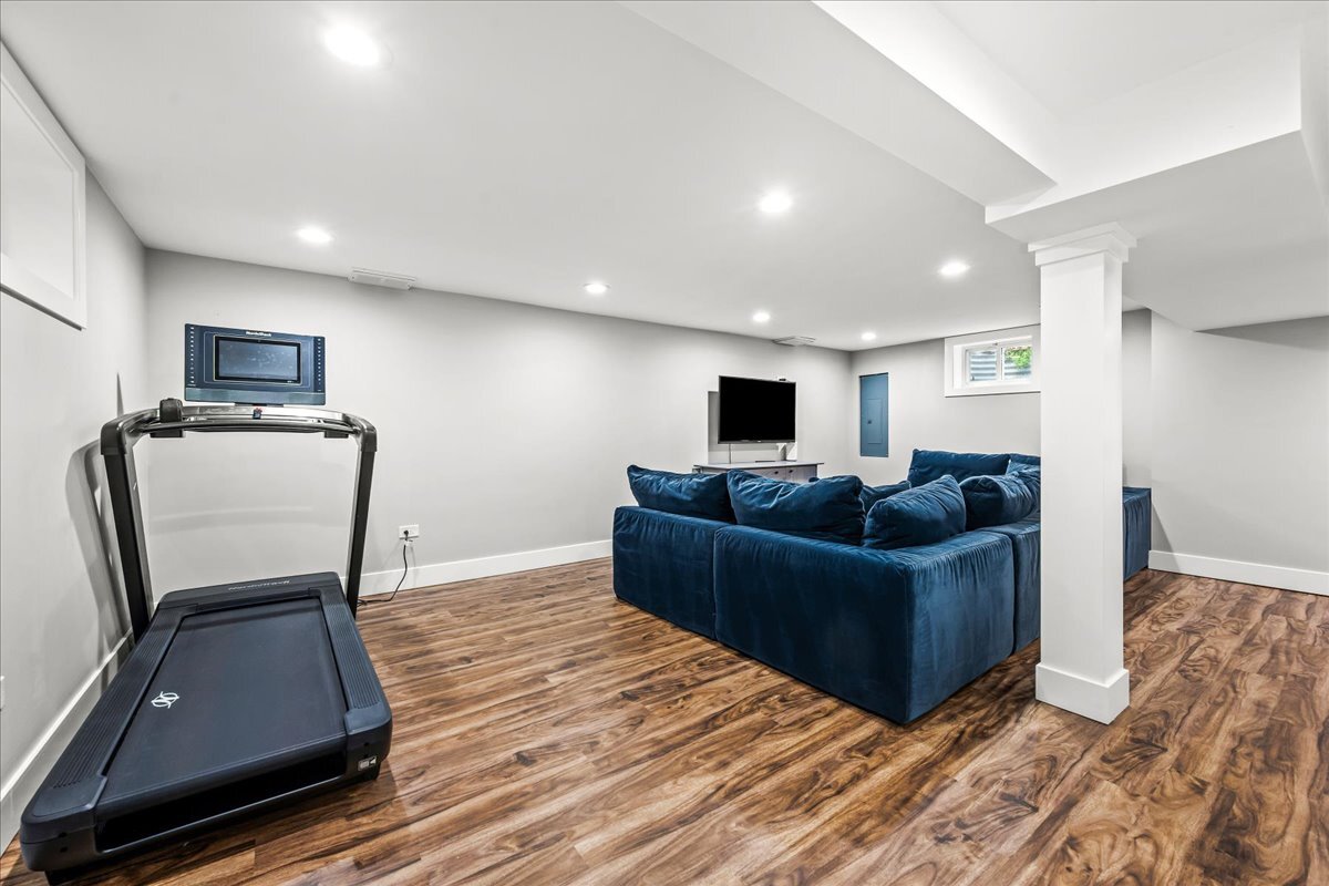 1541 Wilmot Road Deerfield, IL 60015 - Photo 18 of 25 a living room with furniture and a wooden floor
