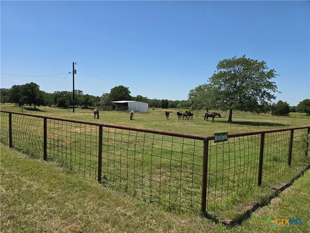a view of a lake with outdoor space