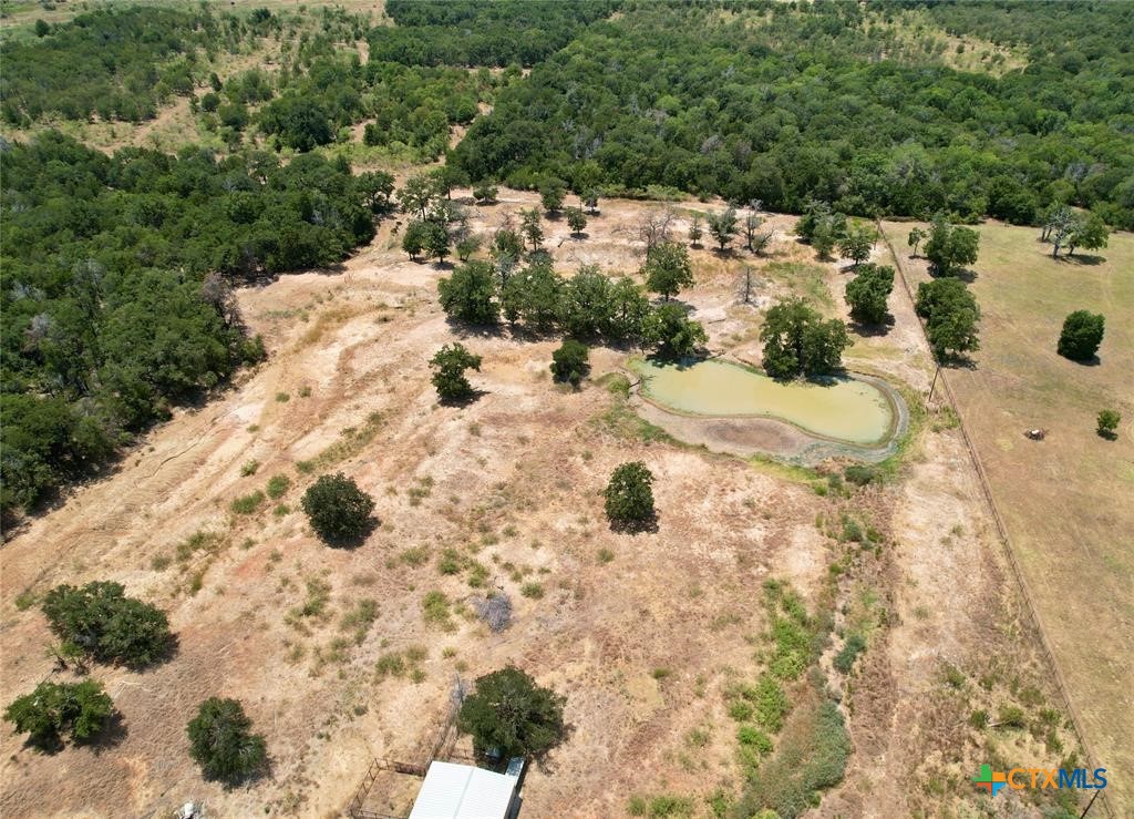 930 Elm Creek Road Rockdale, TX 76567 - Photo 24 of 25 a view of a backyard of the house