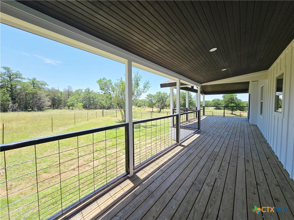 930 Elm Creek Road Rockdale, TX 76567 - Photo 3 of 25 a view of balcony with wooden floor