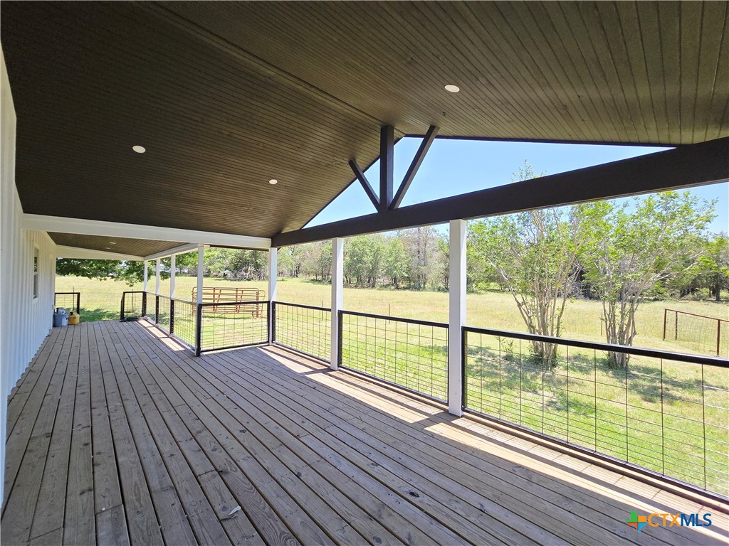 930 Elm Creek Road Rockdale, TX 76567 - Photo 4 of 25 a view of porch with wooden floor