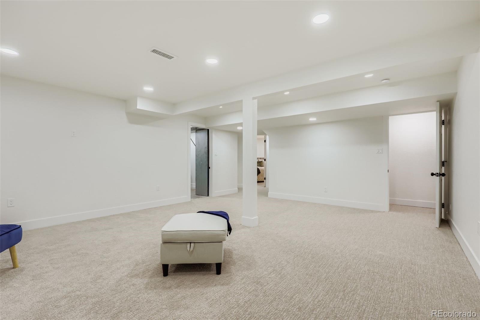 4465 Durham Court Denver, CO 80239 - Photo 21 of 28 a view of a livingroom with furniture and a couch