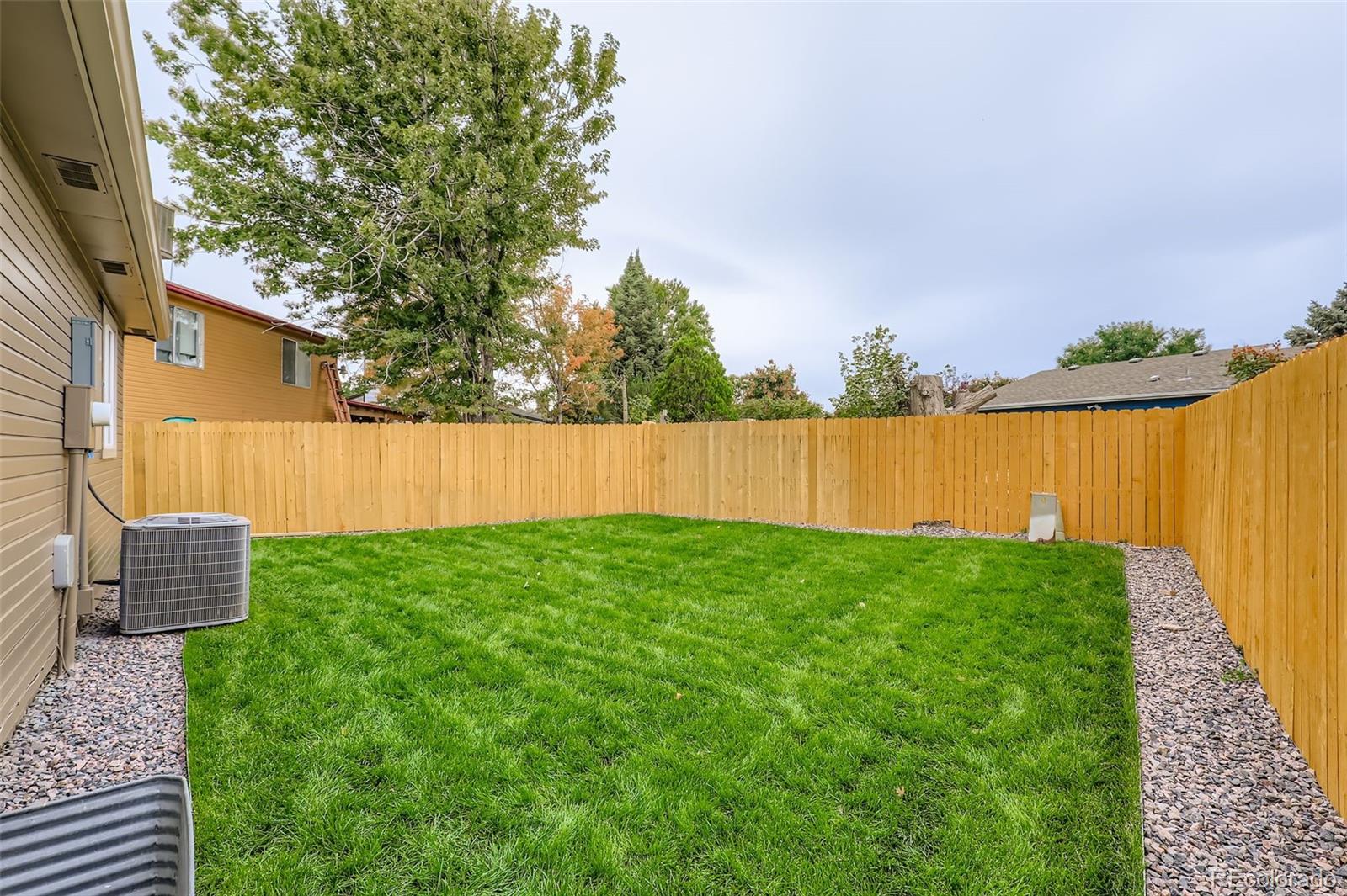 4465 Durham Court Denver, CO 80239 - Photo 27 of 28 a view of outdoor space and yard