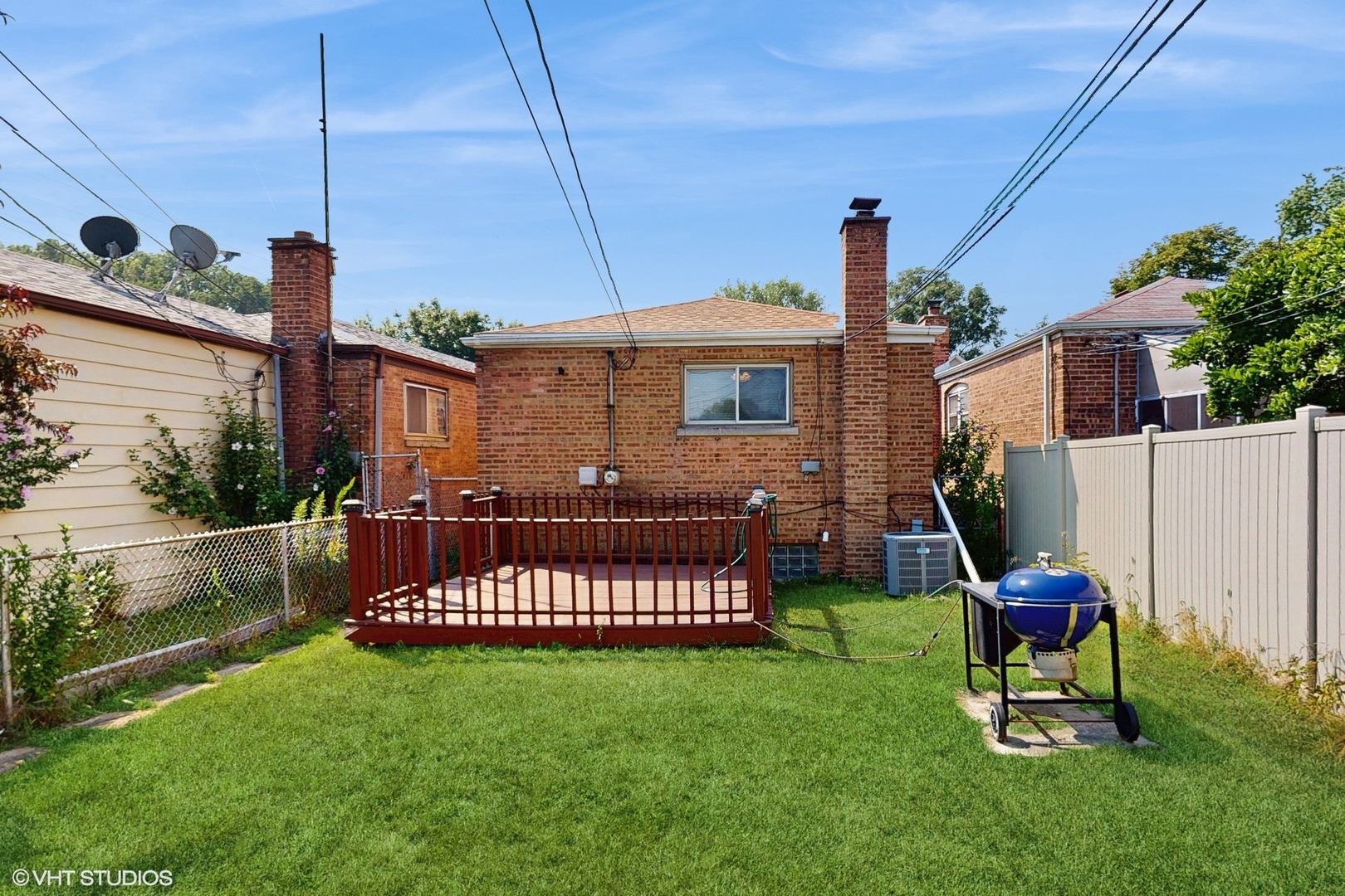 3052 East 97th Street Chicago, IL 60617 - Photo 16 of 19 a view of a chairs and backyard