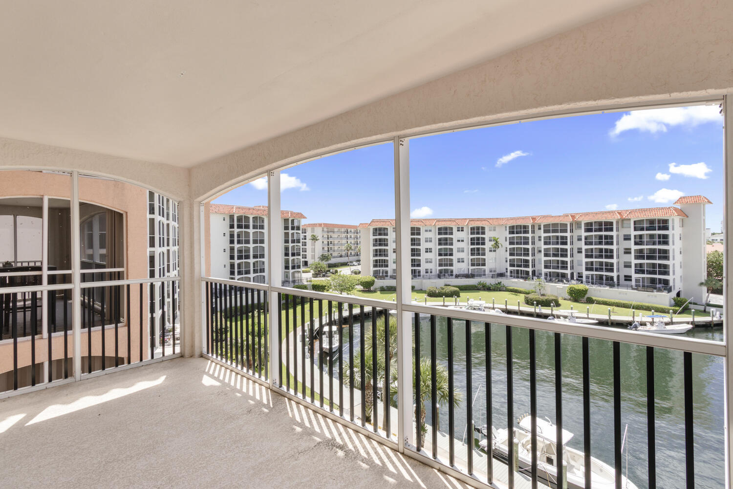 2871 North Ocean Boulevard, Unit V443 Boca Raton, FL 33431 - Photo 5 of 49 a view of a balcony with an outdoor space