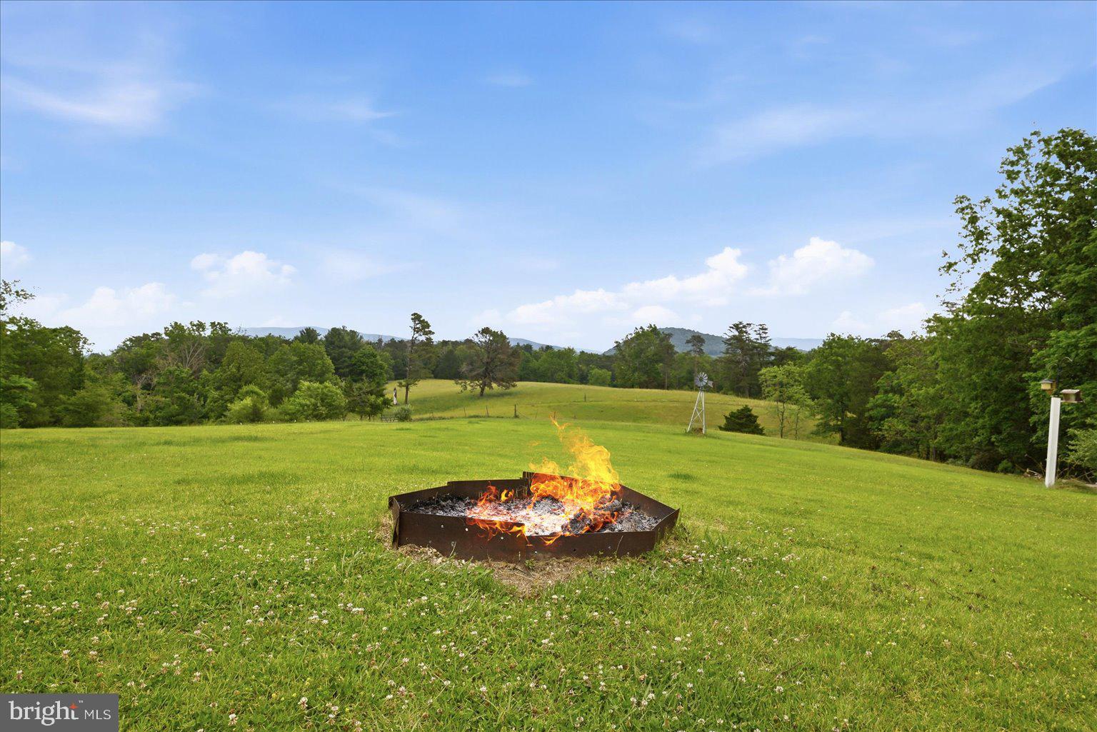 14636 Turner Road Fulks Run, VA 22830 - Photo 57 of 87 Cozy fire pit in serene landscape.