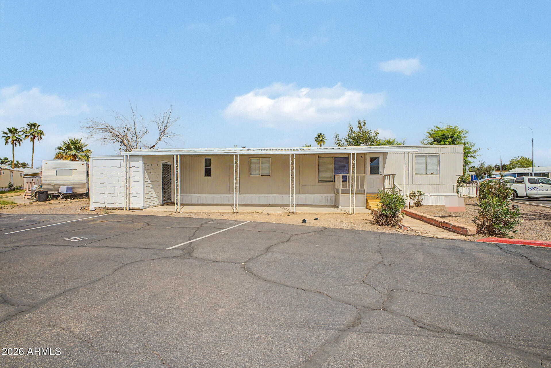 front view of a house with a street