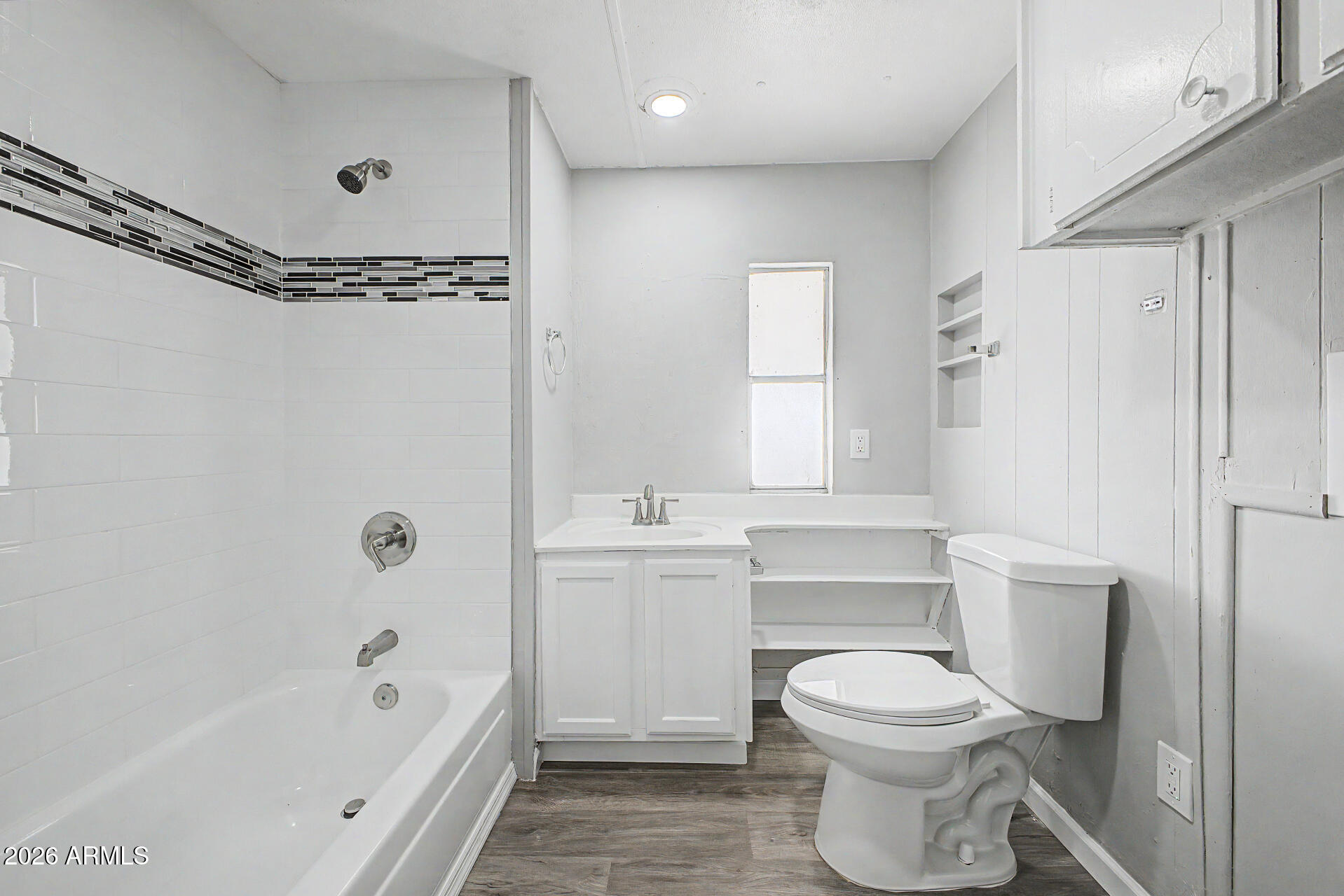 555 West Warner Road, Unit 45 Chandler, AZ 85225 - Photo 15 of 22 a bathroom with a toilet a sink and bathtub