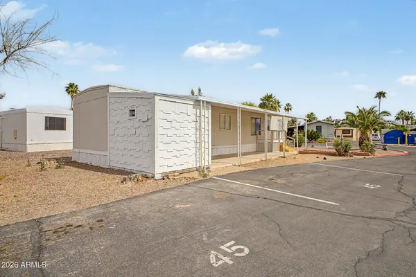 a view of a house with a street