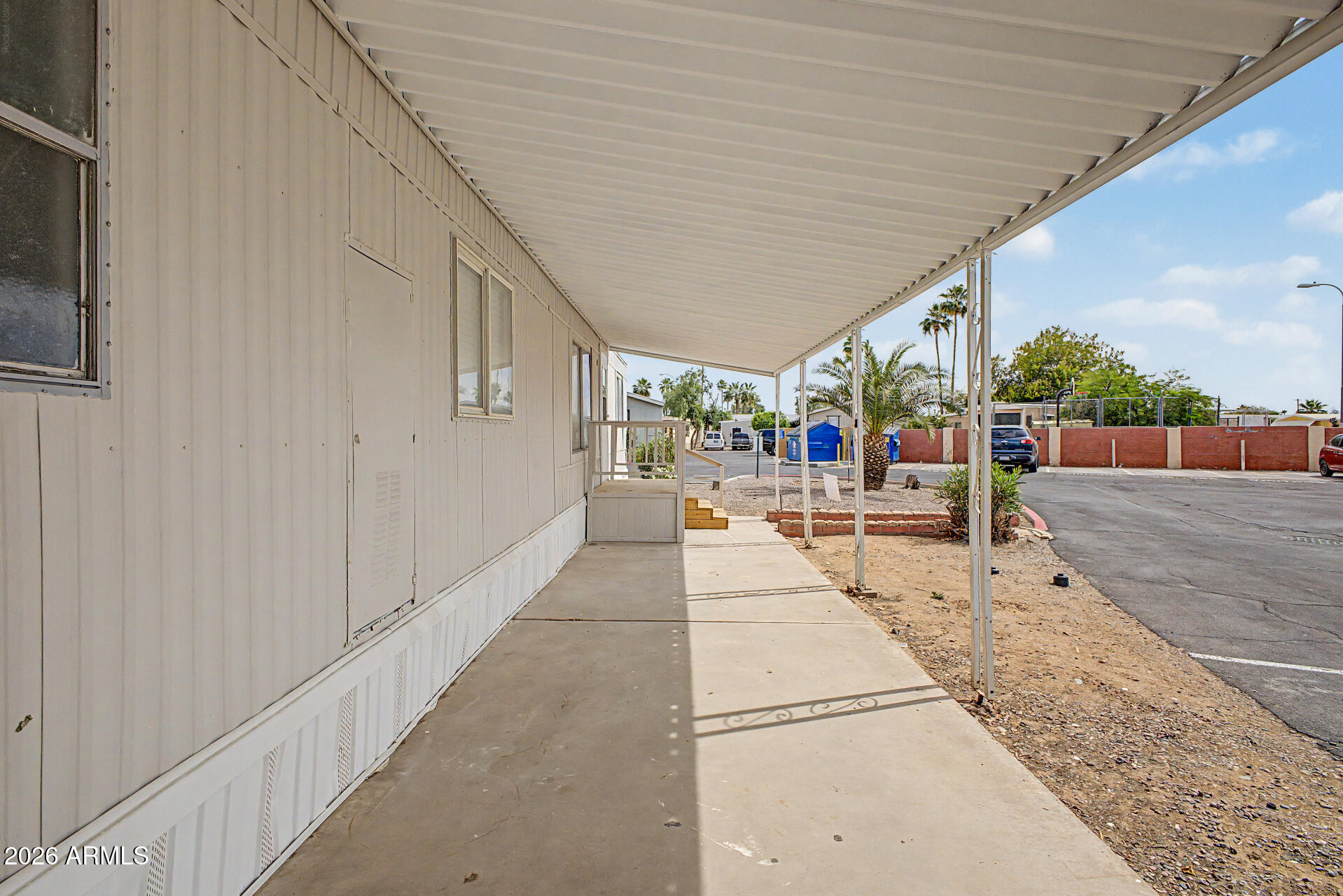 555 West Warner Road, Unit 45 Chandler, AZ 85225 - Photo 4 of 22 a lobby with glass door and glass door