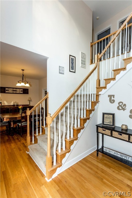 10201 Taylor Road Chesterfield, VA 23838 - Photo 15 of 50 a view of staircase and living room with wooden floor