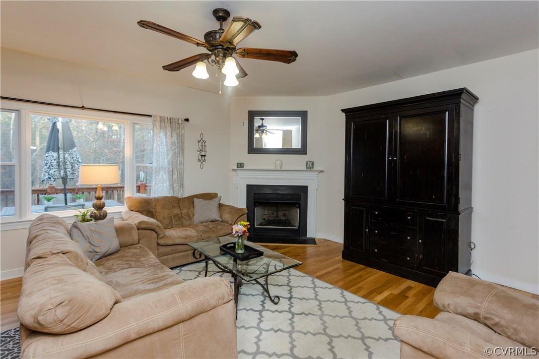 10201 Taylor Road Chesterfield, VA 23838 - Photo 19 of 50 a living room with furniture and a fireplace