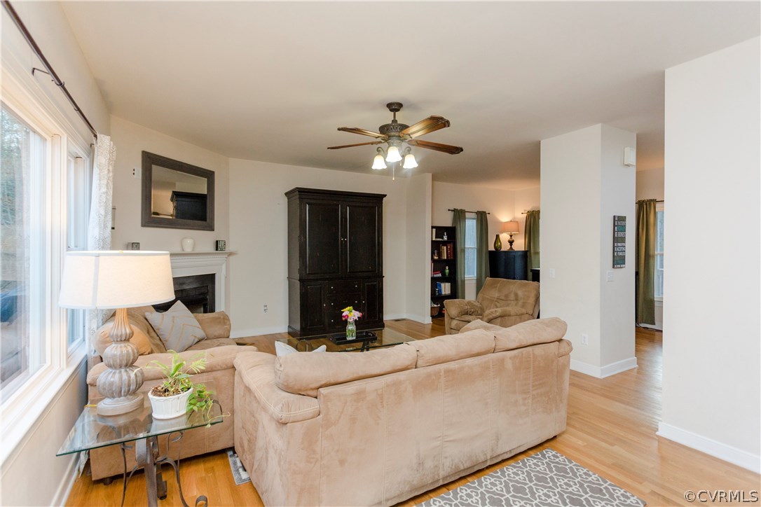 10201 Taylor Road Chesterfield, VA 23838 - Photo 20 of 50 a living room with furniture fireplace and a flat screen tv