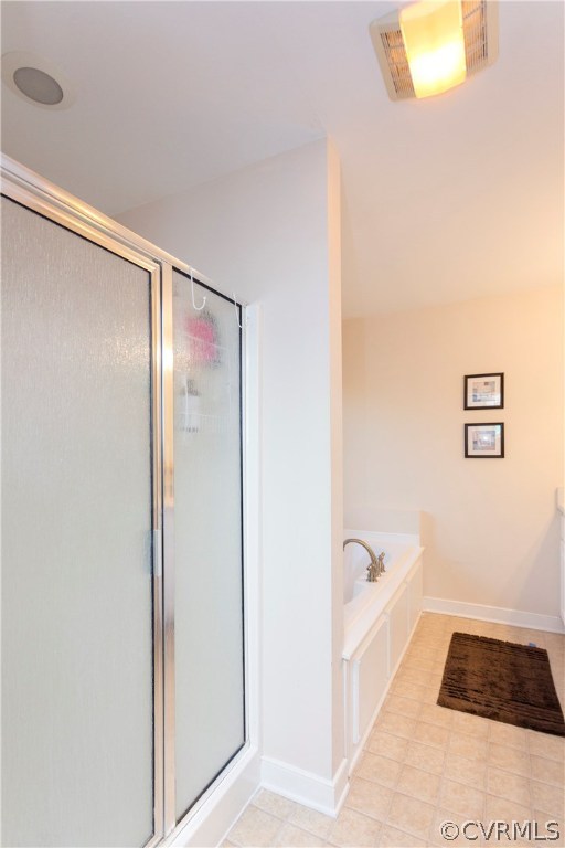 10201 Taylor Road Chesterfield, VA 23838 - Photo 27 of 50 a bathroom with a bathtub and a shower