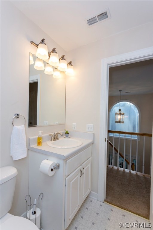 10201 Taylor Road Chesterfield, VA 23838 - Photo 32 of 50 a bathroom with a sink a mirror and a toilet