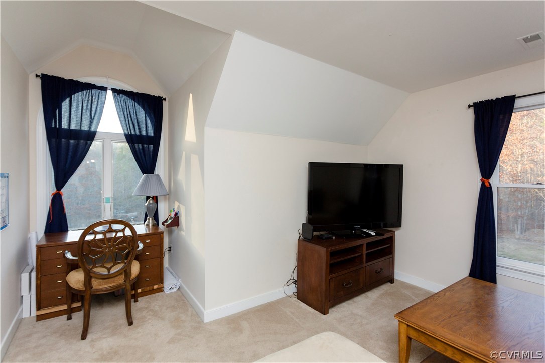 10201 Taylor Road Chesterfield, VA 23838 - Photo 38 of 50 a view of a livingroom with furniture and a flat screen tv