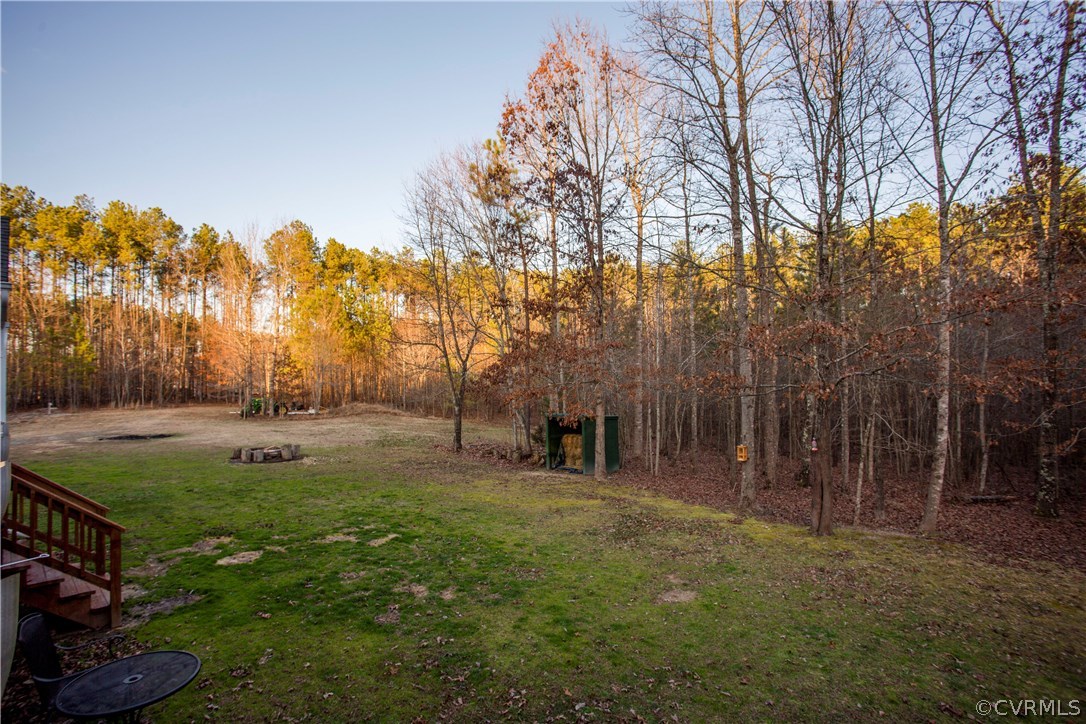 10201 Taylor Road Chesterfield, VA 23838 - Photo 40 of 50 a backyard of a house with lots of green space