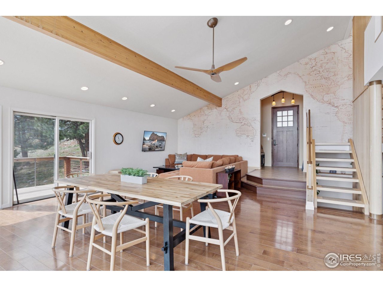 8654 Thunderhead Drive Boulder, CO 80302 - Photo 19 of 40 a view of a dining room with furniture and wooden floor