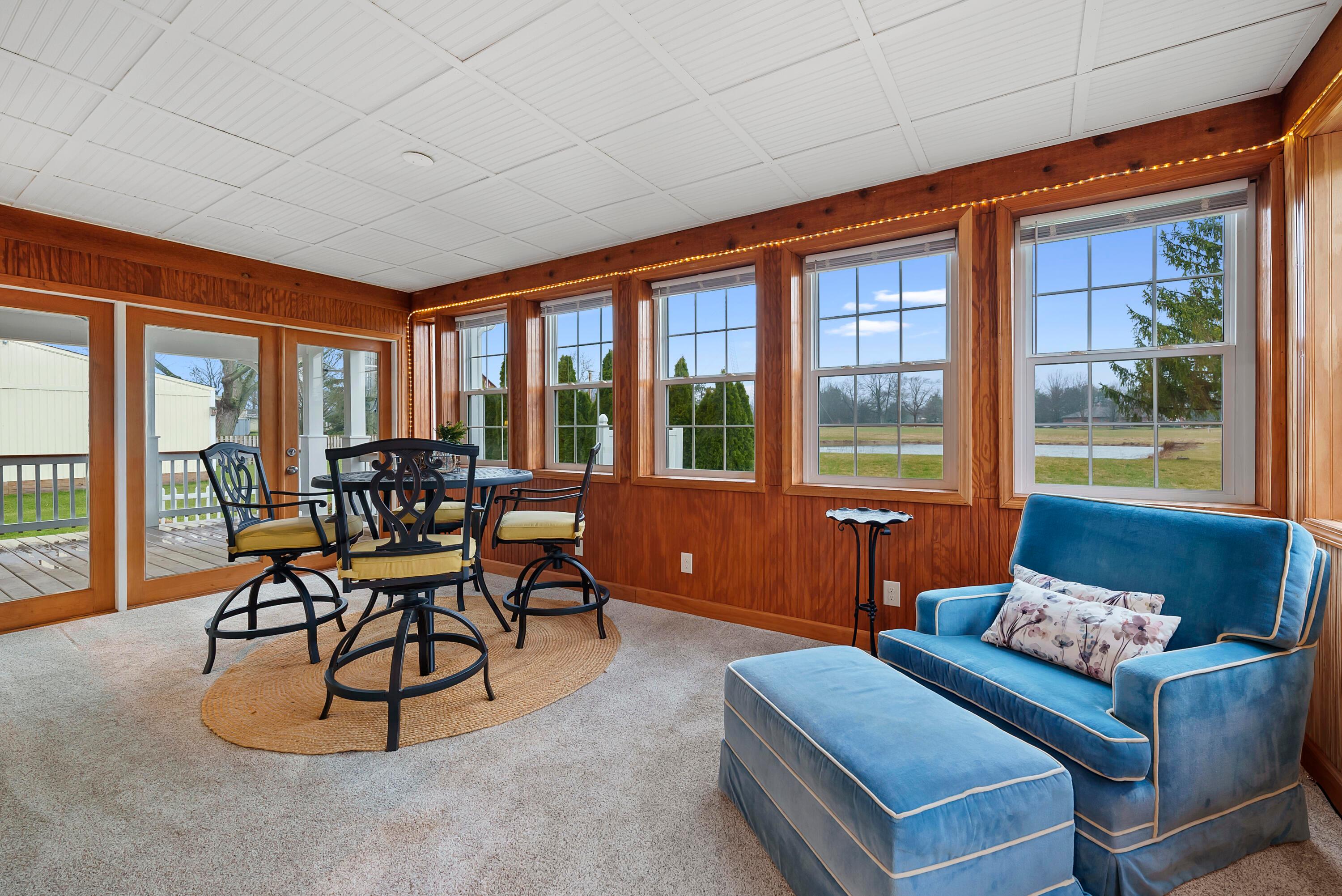 3174 Rome Corners Road Galena, OH 43021 - Photo 8 of 33 Sun room has double french doors and walls of windows